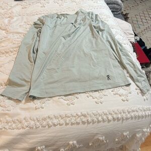 On long sleeve light mint green small shirt